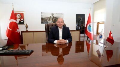 Menderes'in Gümüldür İnönü Mahallesi Muhtarı Bahar Bilecen, eşi ve ritim